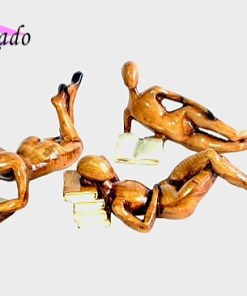 مجسمه دکوراتیو آدمک کتاب‌خوان پلی‌استر